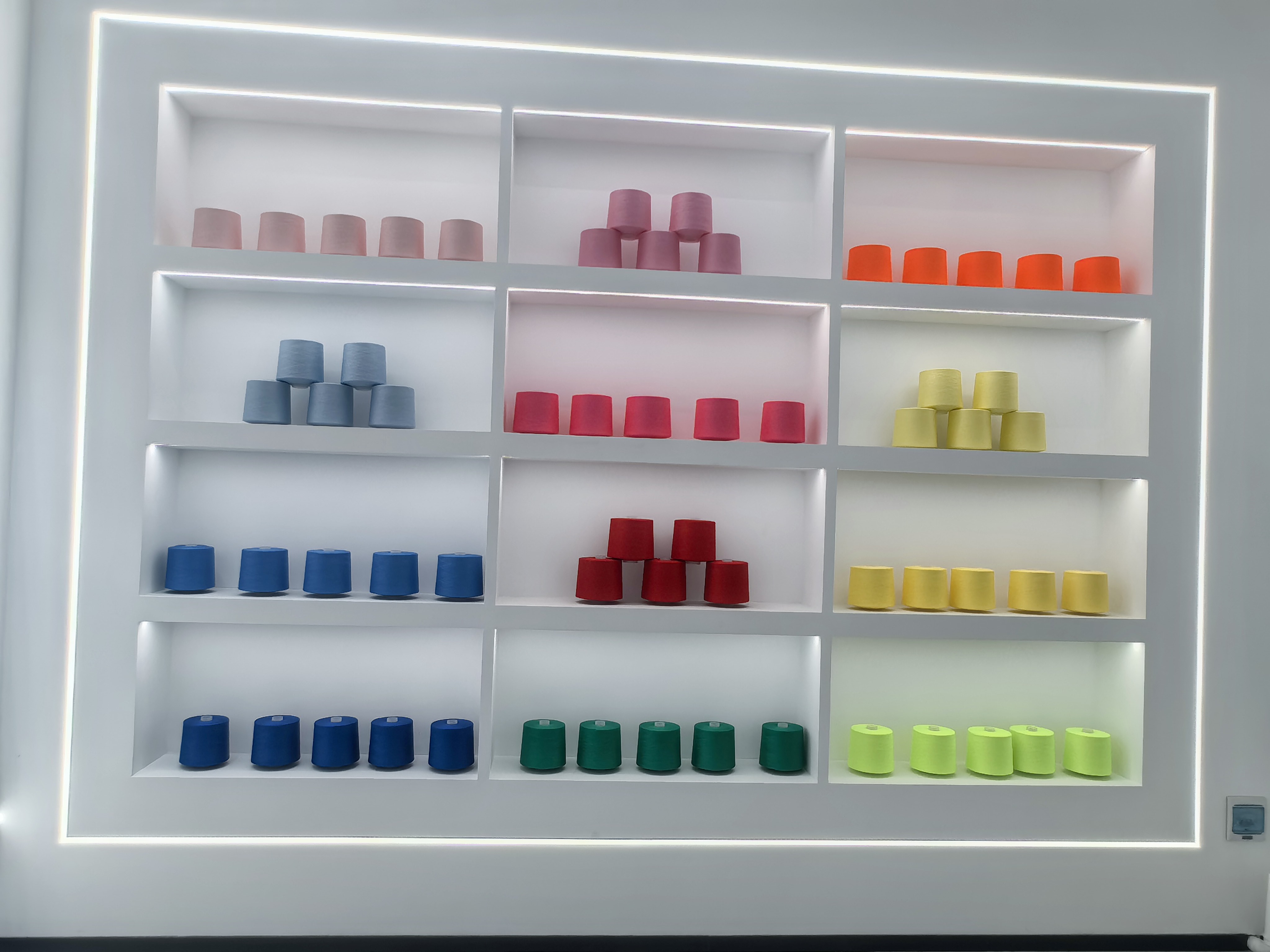 Colored thread display wall